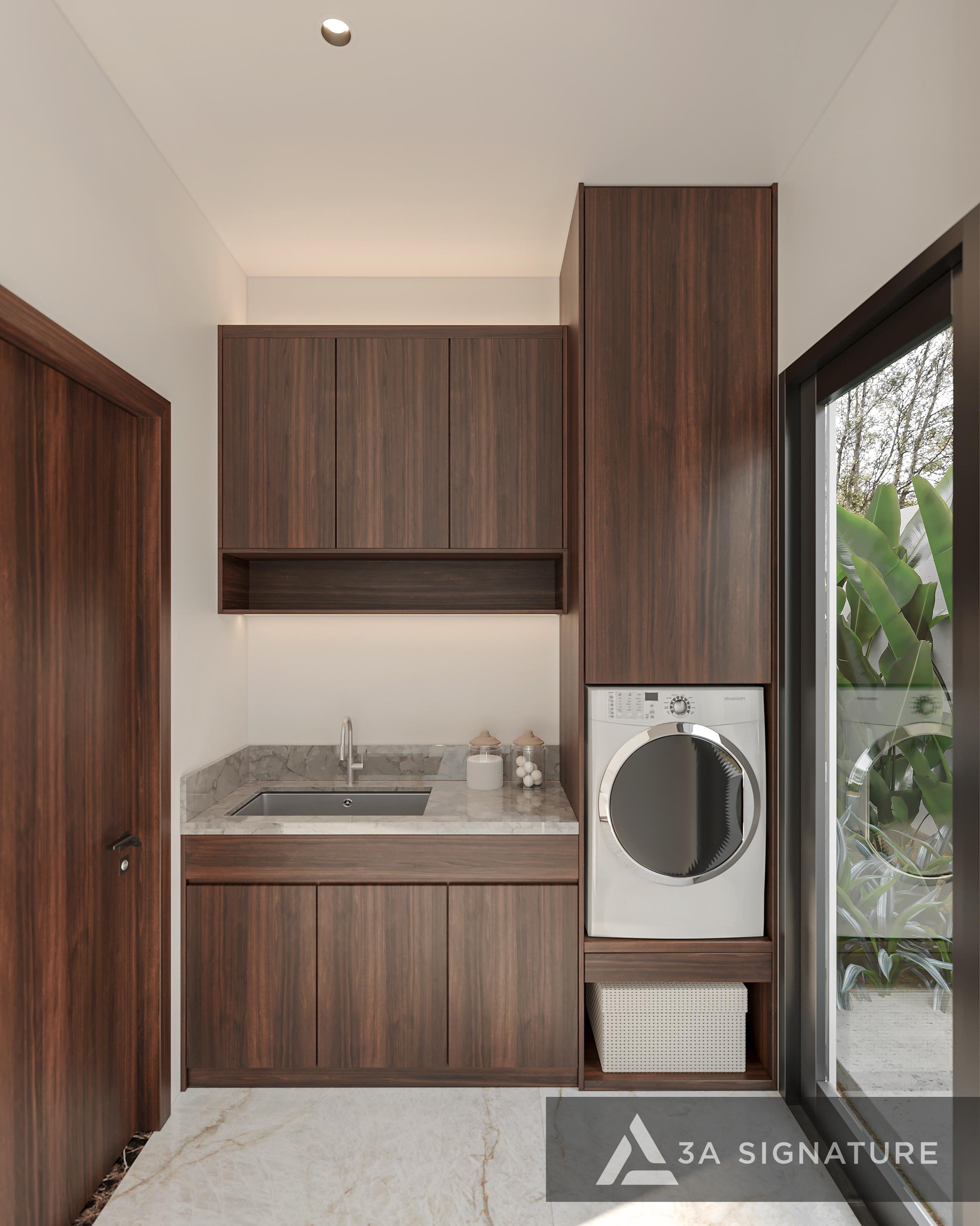 Khu vực giặt phơi sử dụng tủ gỗ và cửa gỗ biệt thự hiện đại với bề mặt chống ẩm, tủ âm tường và máy sấy bố trí gọn gàng trong không gian sáng tự nhiên.