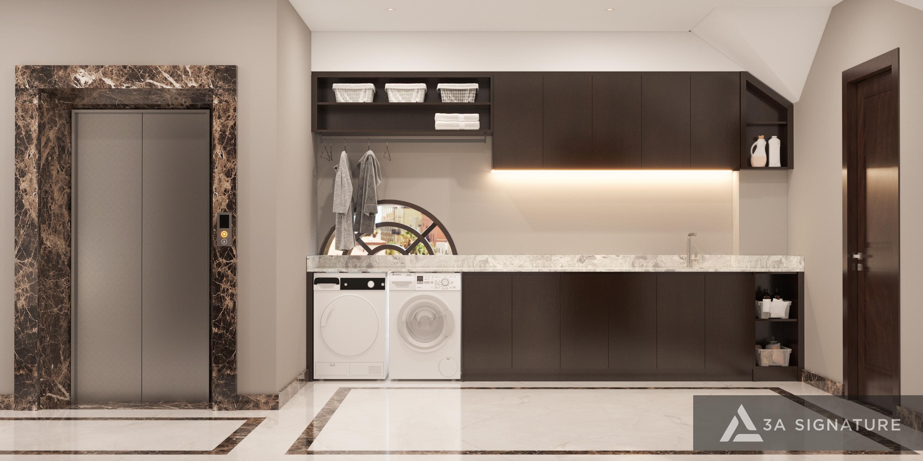Mẫu Thiết Kế Biệt Thự Phố Tối Ưu Không Gian - Tự Nhiên Dẫn Lối Từng Bước Khu vực thang máy biệt thự phố với đá marble, hệ tủ tối màu, thiết bị giặt sấy âm tường và ánh sáng ấm, thể hiện thiết kế tiện nghi và tinh tế của 3A Signature.