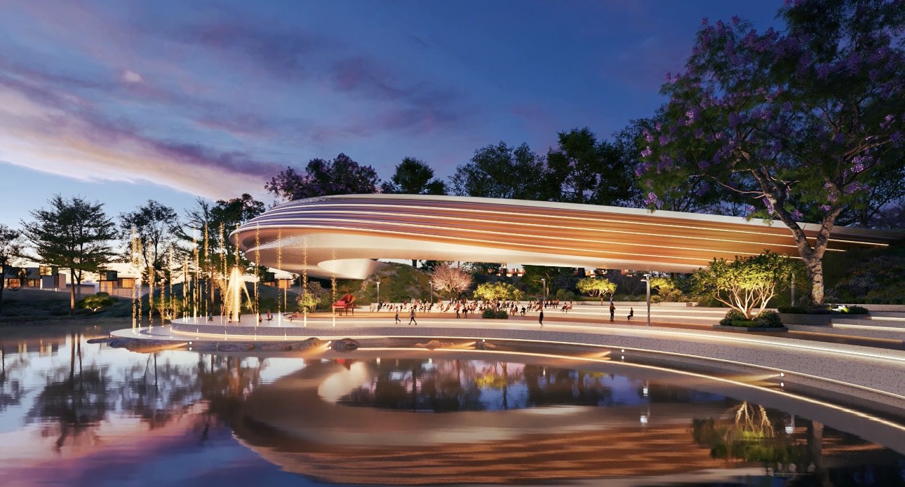 Quảng trường ánh sáng tại Ecopark Long An ban đêm với sân khấu ngoài trời, đài phun nước và không gian sinh hoạt cộng đồng giữa thiên nhiên.

