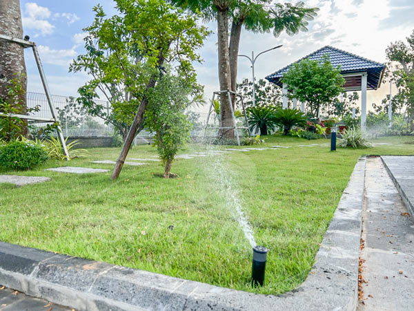 Automatic watering system hidden beneath villa gardens, maintaining natural beauty and efficiency in 3A Signature’s Tropical Modern design.