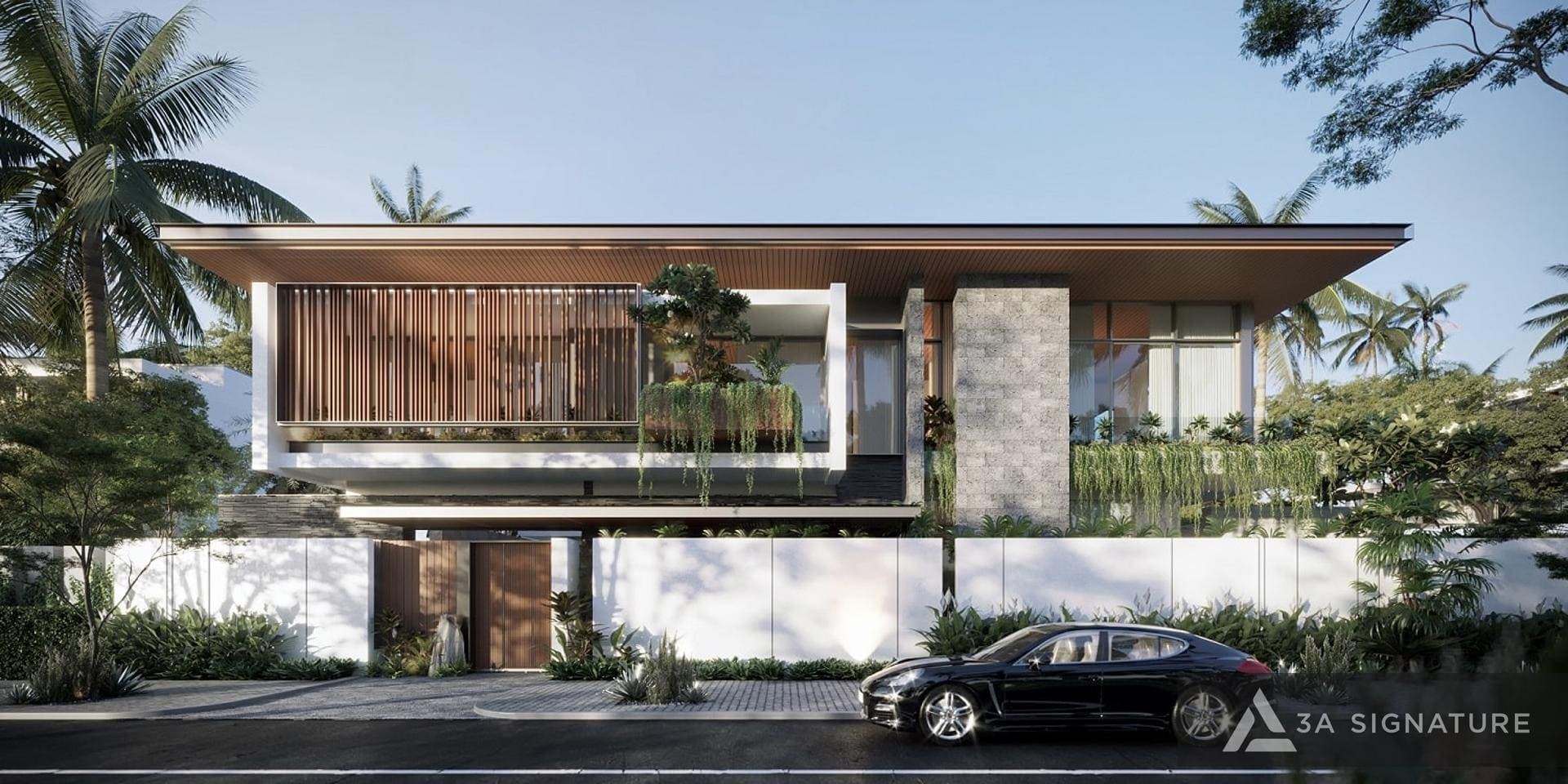 Beautiful Villa Models By 3A Signature – Where Green Living Memories Begin Beautiful Villa by 3A Signature showcasing a Tropical Modern façade with local stone walls, wooden louvers, hanging plants, and wide horizontal rooflines, expressing harmony between architecture and natural materials.