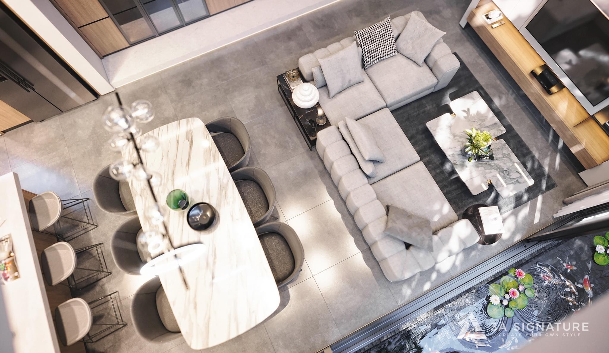 Lựa Chọn Vật Liệu Cho H Villa - Định Hình Không Gian Sống Không gian nội thất H Villa với gạch lát khổ lớn, sofa vải sáng màu, bàn ăn đá vân mây và hồ cá thư giãn – thể hiện tinh thần lựa chọn vật liệu hiện đại.